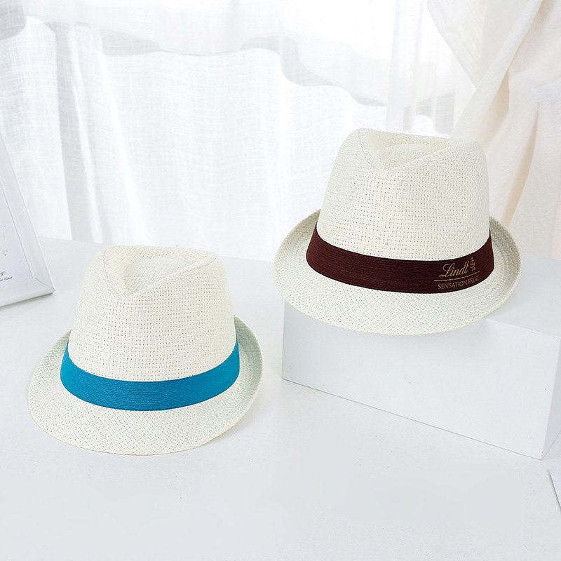 Kultainen logo Trilby Sun Straw Hat promootioon